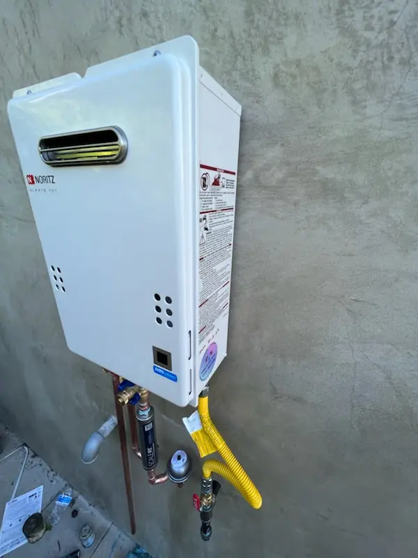 Tankless water heater installation for Penn State Campus homes